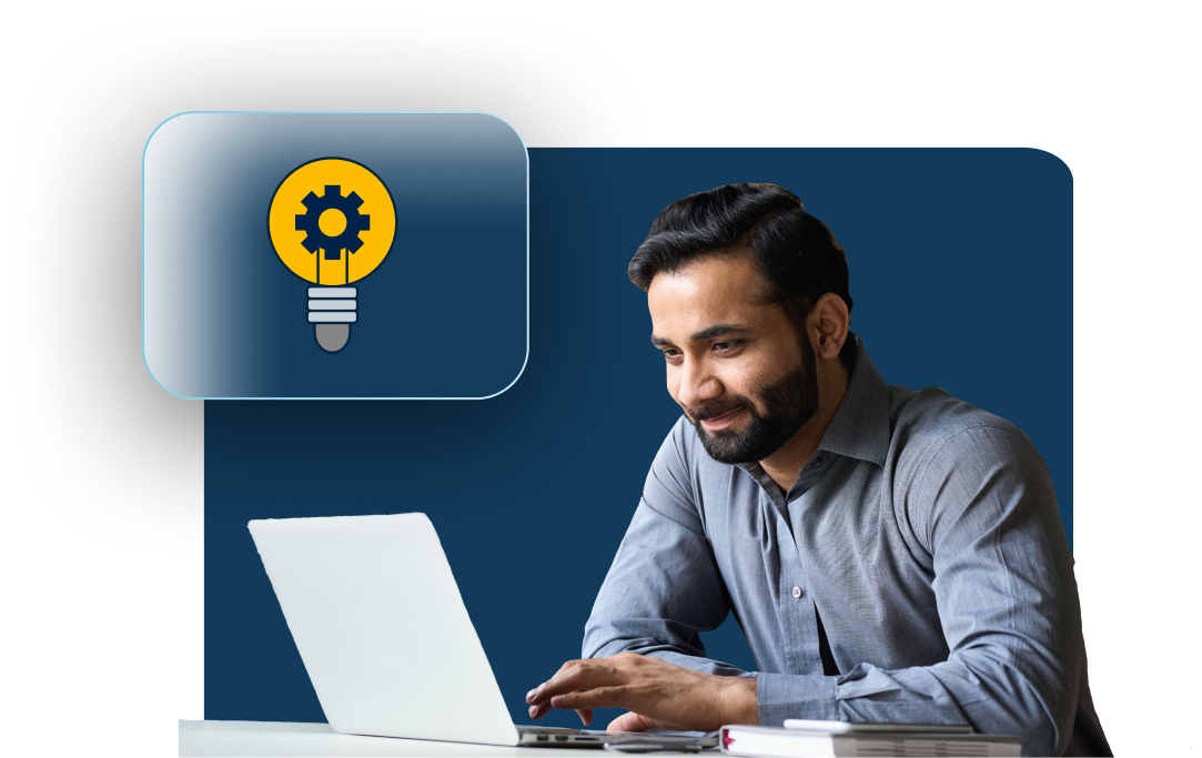 man smiling working on a laptop with lightbulb illustration in the foreground